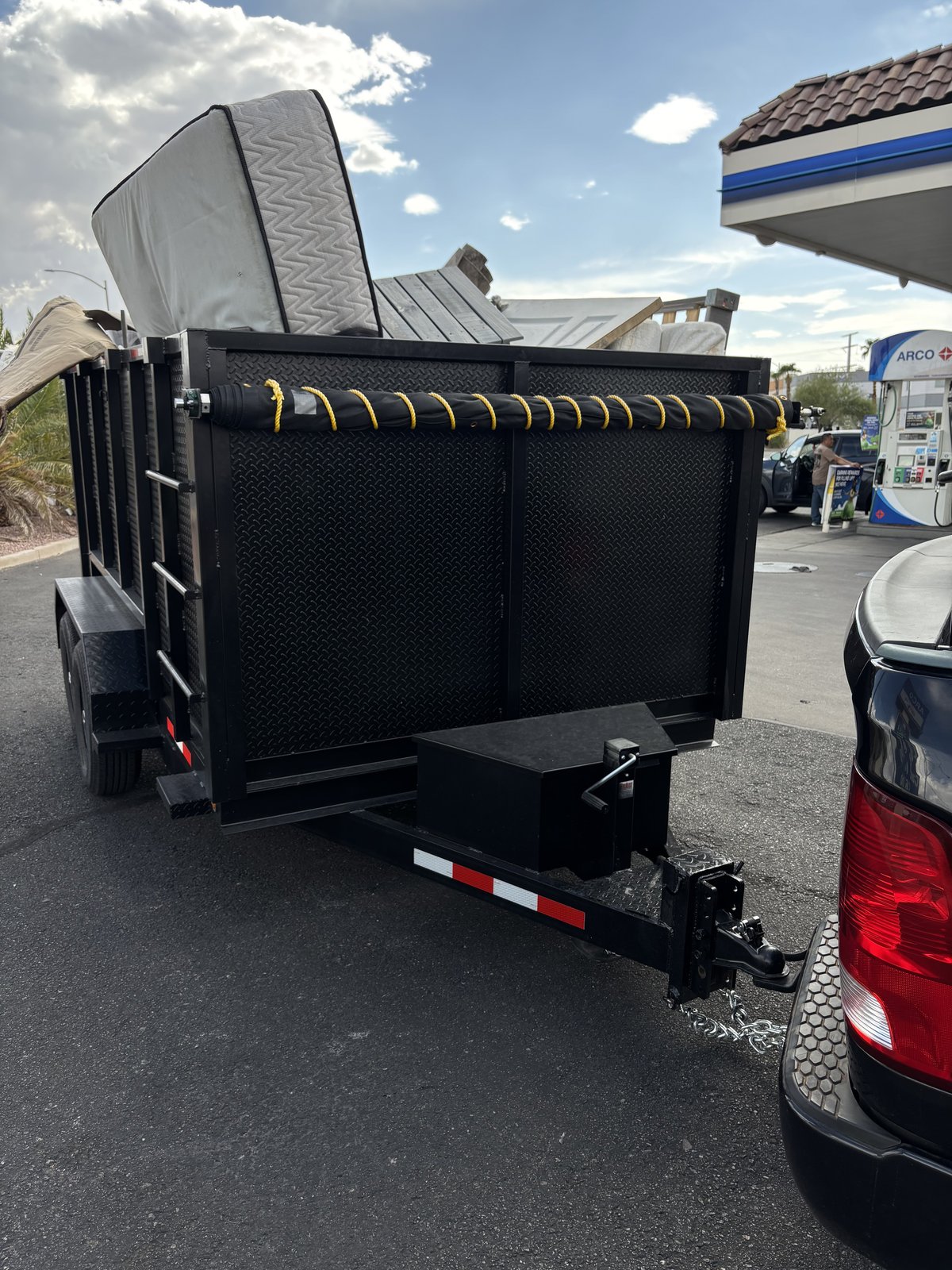 Dump trailer unloading a full load